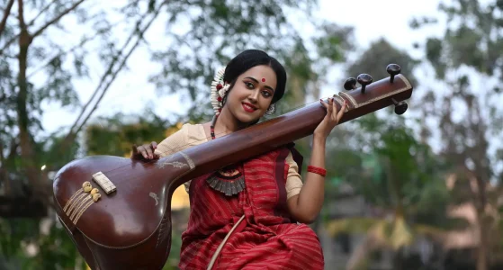 woman playing veena