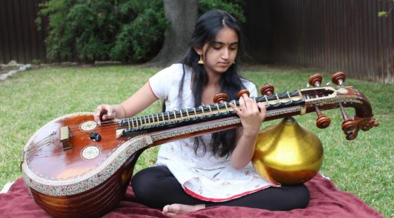 Girl playing veena